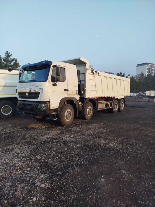 Автосамосвал Howo-T7S 8x4 - 32 т / 26 куб.м Sunhunk