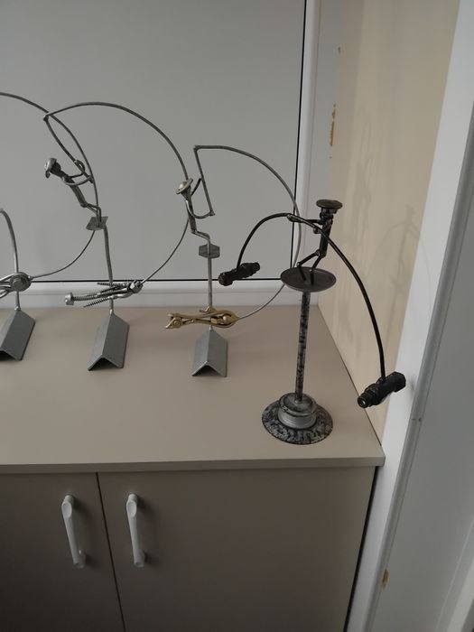 Сувенирчики неваляшки,рыбаки, акробаты.