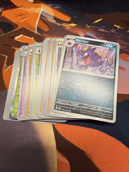 66 carti Pokemon din setul Perfect Order  plus 4 carti Energy