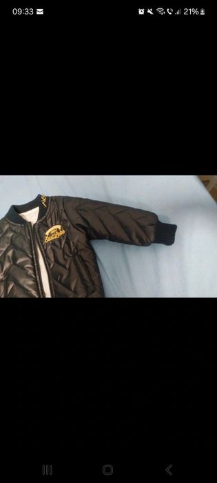 Geaca matlasata cu blugi