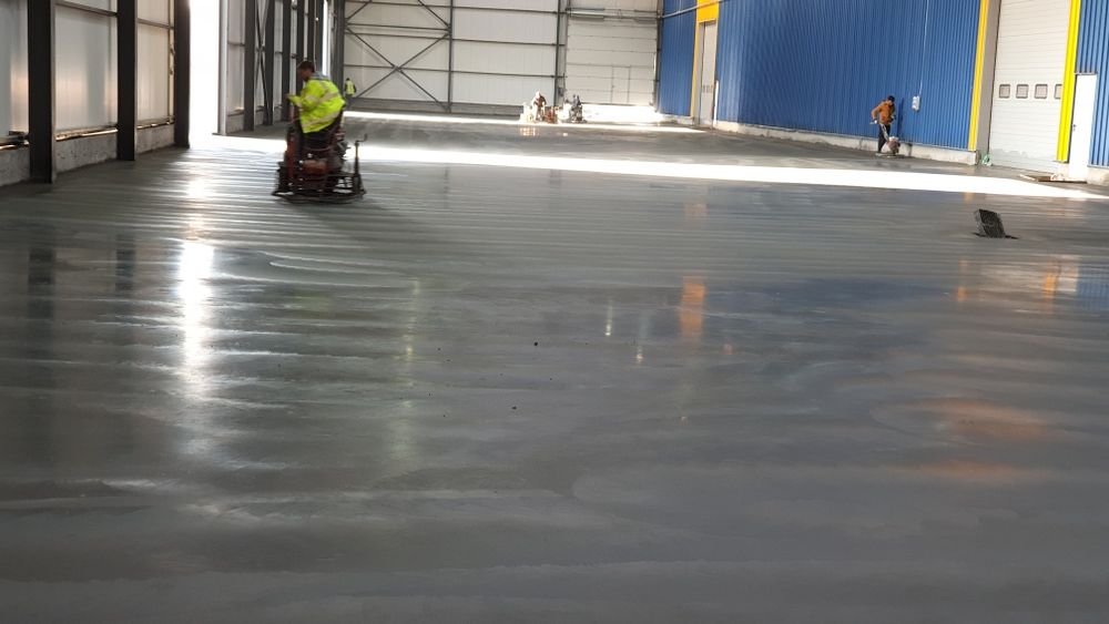 Turnare Beton finisat mecanic cu elicopter si Cuart, șapa din beton