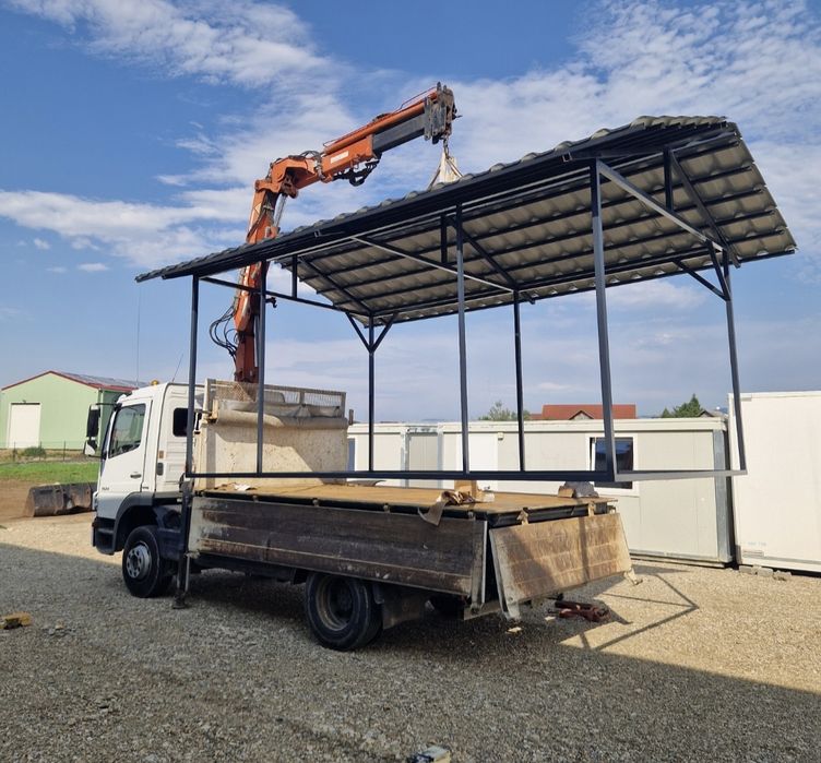 Transport cu macara basculabil