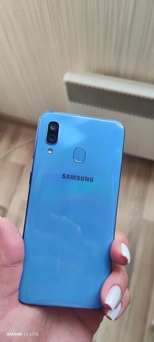 Телефон Samsung A20