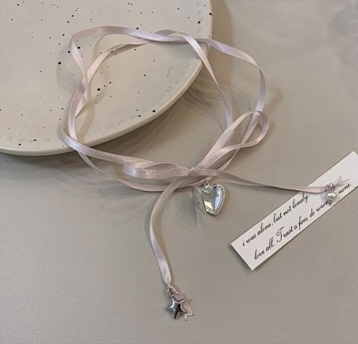 Красивый чокер с сердечком