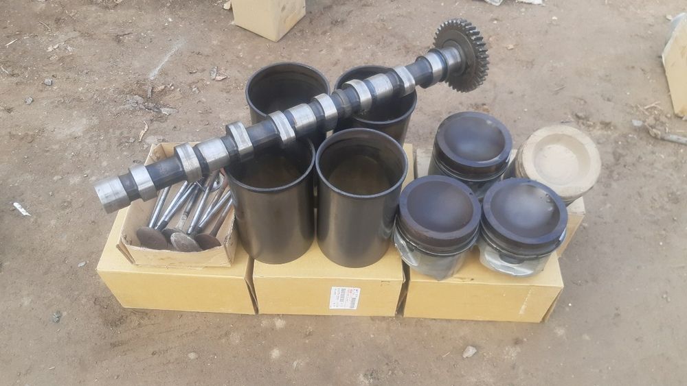 Isuzu zapchast raspiridval porshin gilza .10 tonna galovka qirishka