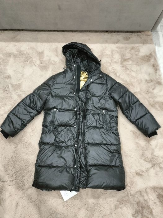 Продам новый пуховик