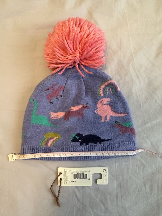 Caciula tricotata Next, cu dinozauri, 50 cm. 1-2 ani