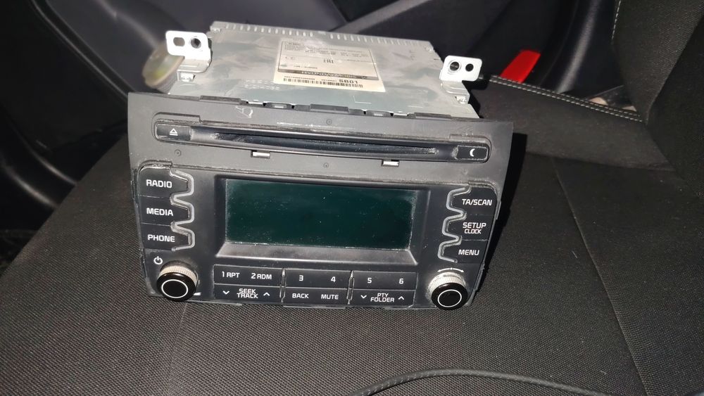 Магнитола Кия спортеж