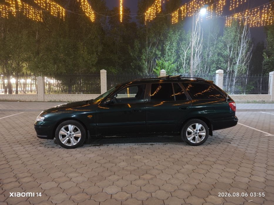 Mazda 626 птичка