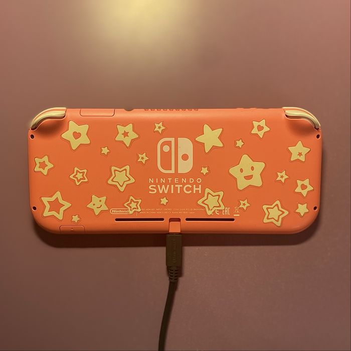 Nintendo switch lite culoare coral nefolosit +jocul animal crossing
