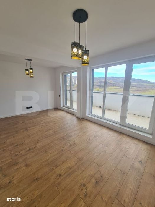Apartament finisat, 52 mp utili, terasa 34 mp, zona Terra — fotografia 1