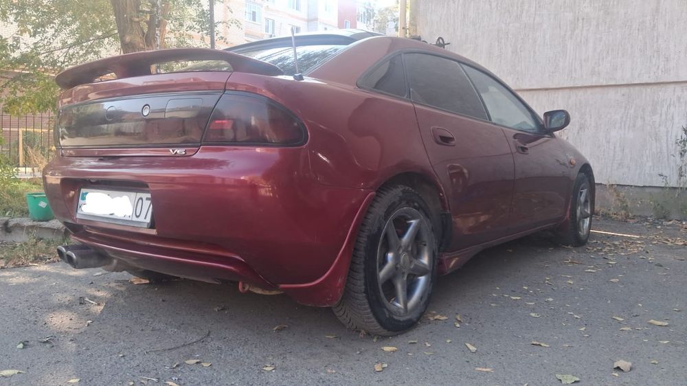 Продам машину Mazda 323