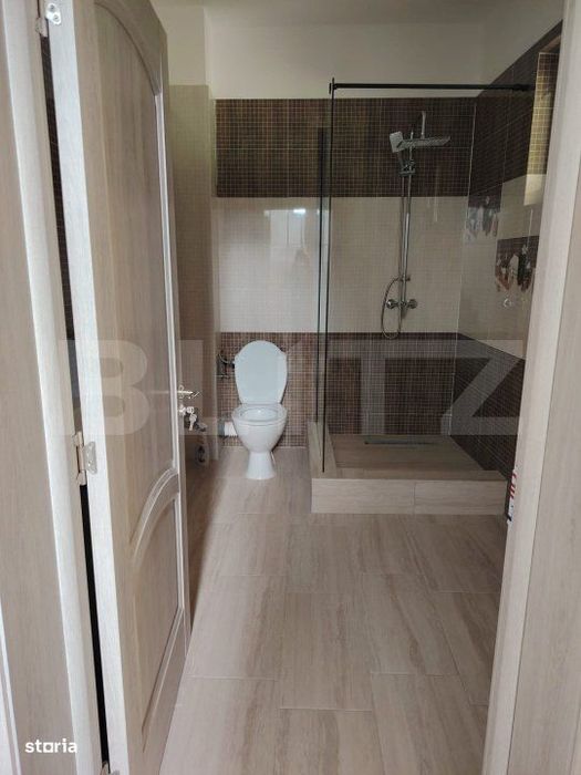 Casa de vanzare, cu 6 camere, 288 mp, zona Voinesti