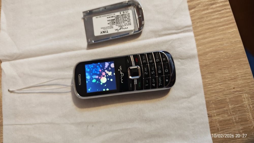 Mini telefon pentru spionaj