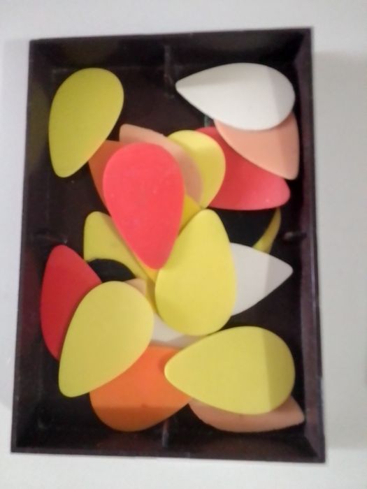 Медиатор для игры на гитаре