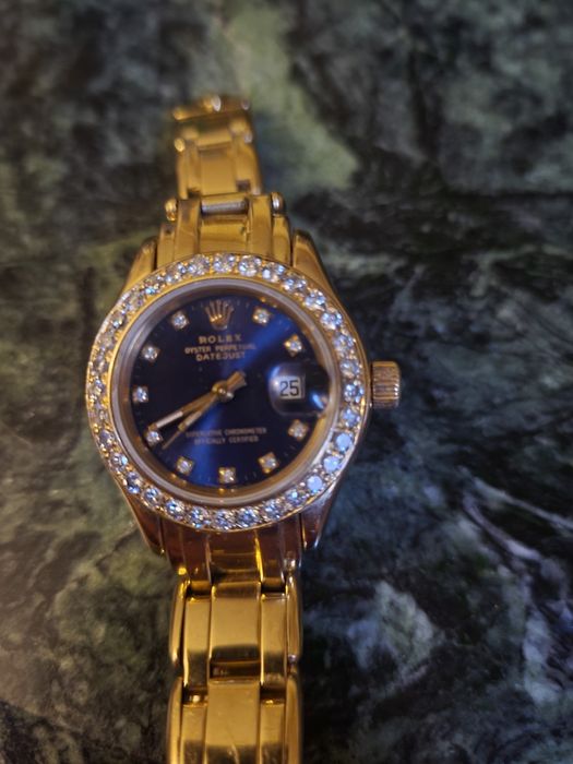 Rolex date just,damă ,31 mm aur 18 kt.