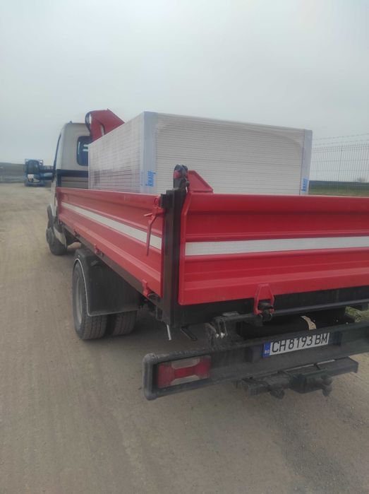 Транспортни услуги.Тристранен самосвал с кран