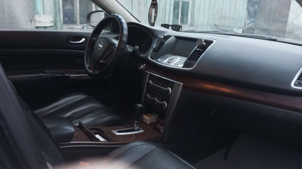 автомобиль nissan teana