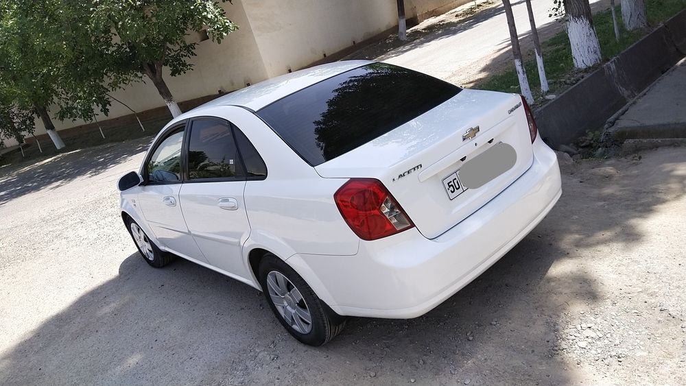 Gentra 1positsiya. 85ming yurgan. Rangi oq. Gazi bor