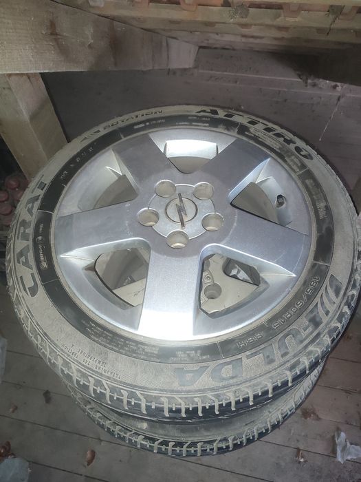 Vând roti de Opel jenți și cauciucuri