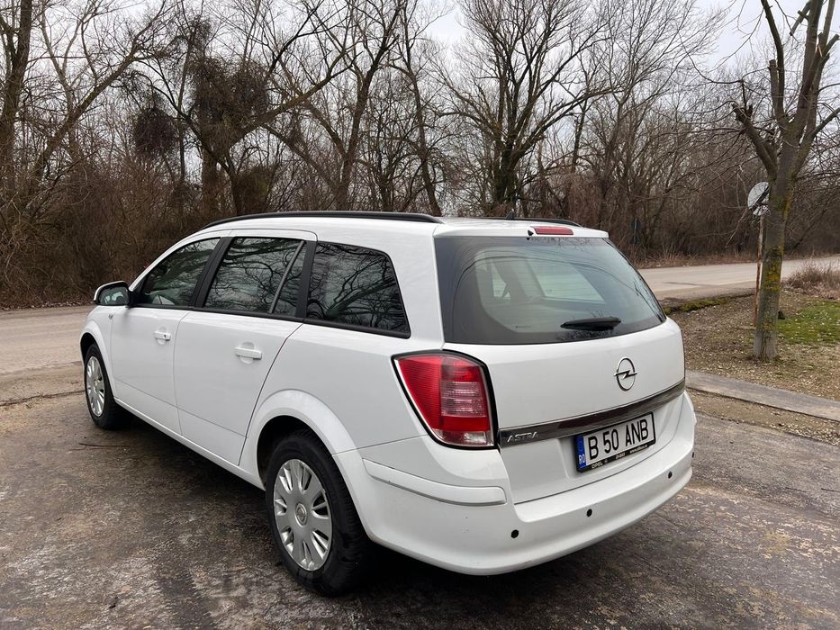 Opel astra h 2013 rulaj doar 100.000 real