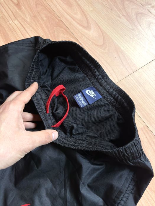 Pantaloni pants parachute joggers vintage cuffed Nike black nylon