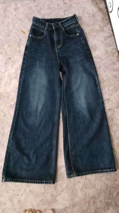 Джинсы почти новые