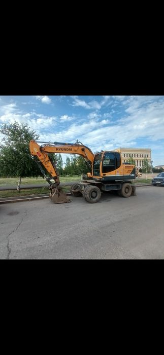Услуги колёсныи экскаватор. Аренда колёсныи экскаватор