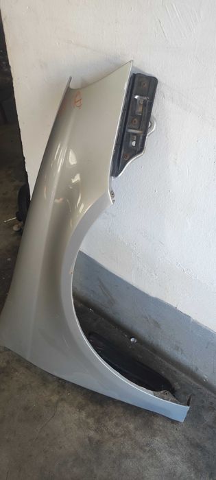 Aripa dreapta fata volkswagen vw jetta an 2007 cu usoare urme de rugina cod culoare LA7W