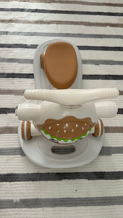 Каталка детская бежевого цвета