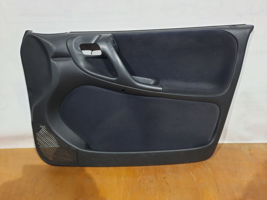 Обшивки передних дверей Астра F