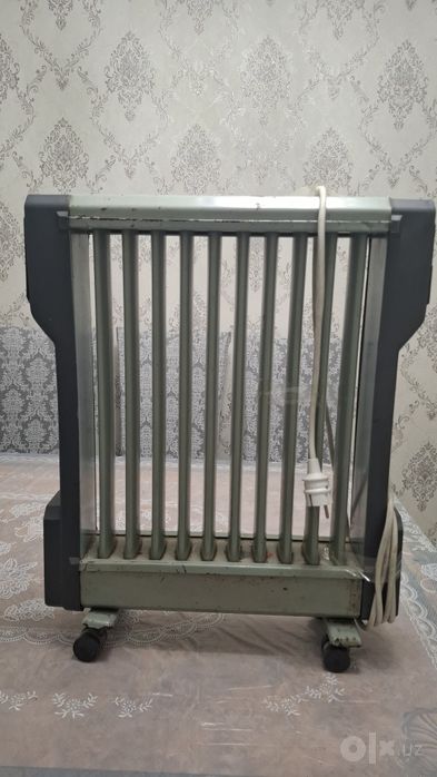 Масляный обогреватель.