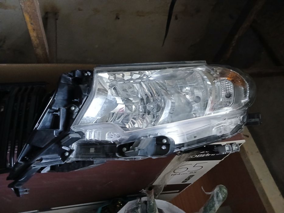 Фары, решетка, магнитола Prado