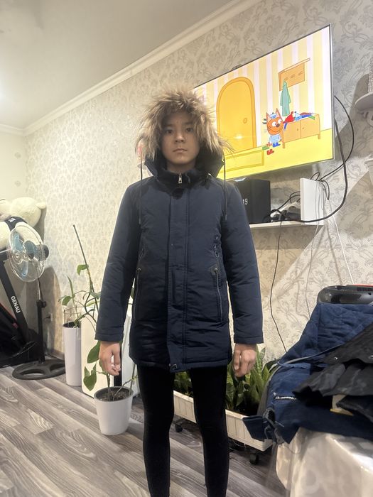 Продам зимнюю теплую куртку