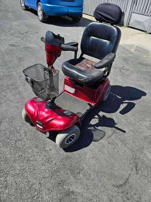 Scuter electric 4 roți Pride Mobility (Model clasic robust - Defect minor)