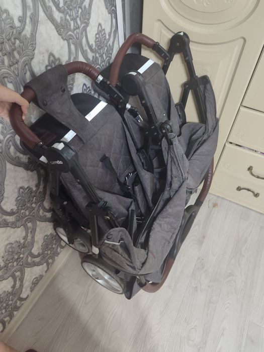 Детская коляска для двойняшек