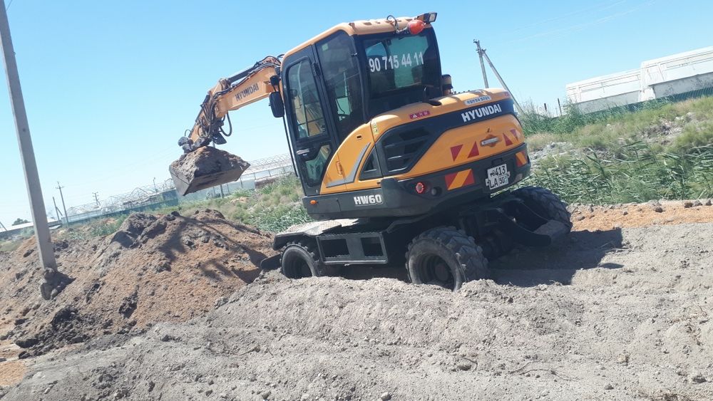 махсус техника экскаватор хизмати бухоро ш