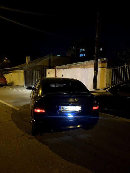 Stopuri/ Lampi Opel Astra G Hatchback cu folie fumurie