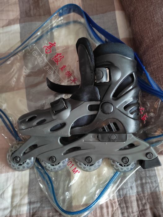 Коньки роликовые