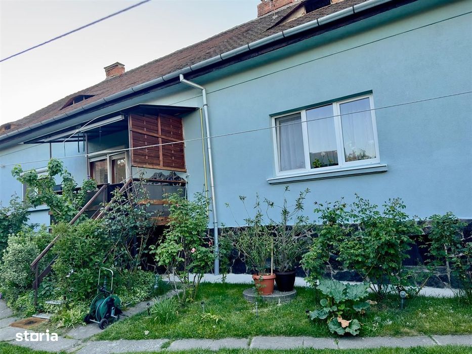 Apartament la casă – 76 mp + terasă + curte + pod mansardabil