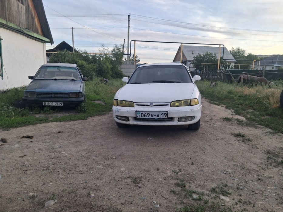 Машина мазда кронос