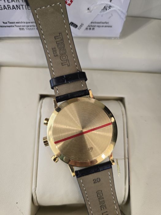 Продам золотые часы Tissot