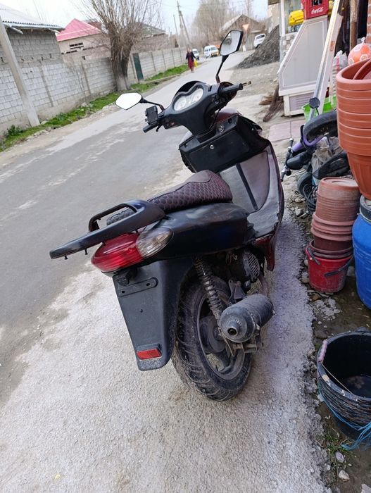 Скутер бензинового