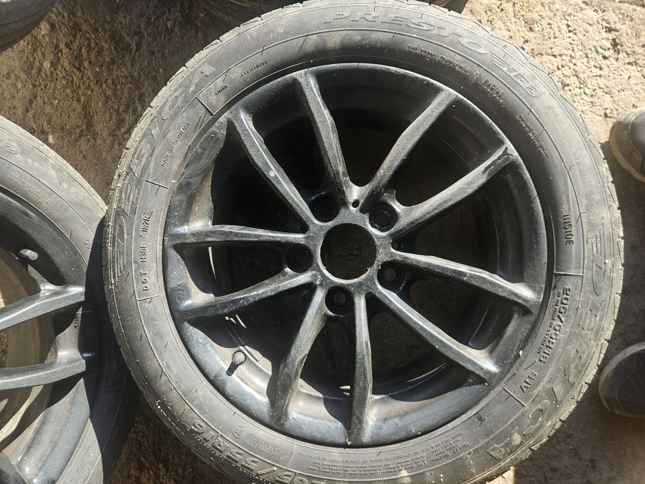 Camd jante roti bmw cu anvelope 205 55 r16