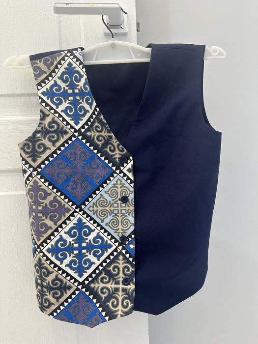 Продам новую жилетку