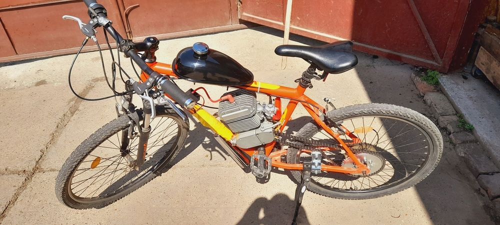 Vând bicicleta cu motor 100cc nou