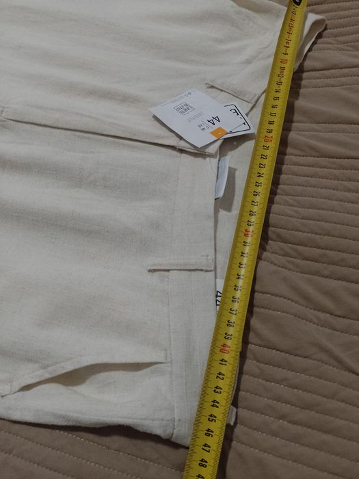 Pantaloni cu talie înaltă și crac larg