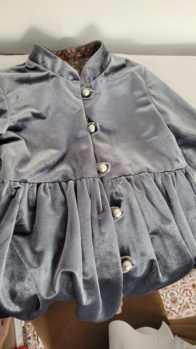 Шапан қыз балаға