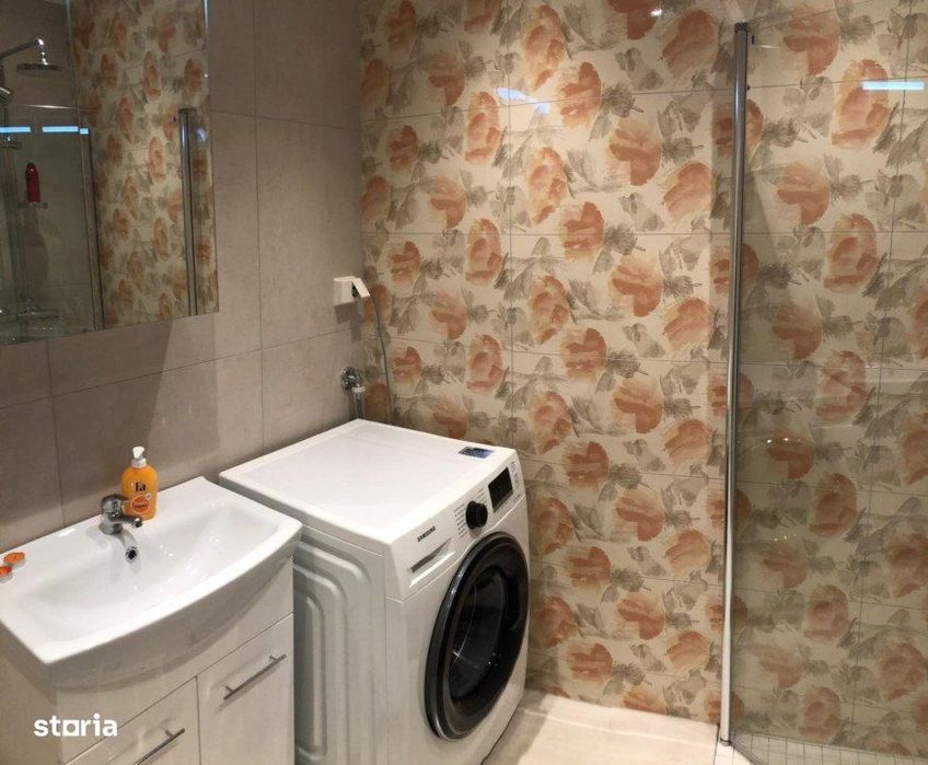 Apartament cu 2 dormitoare, gradina, bucatarie cu dining parcare, zona