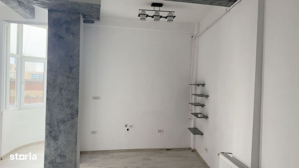 Studio de vanzare Piata Romana